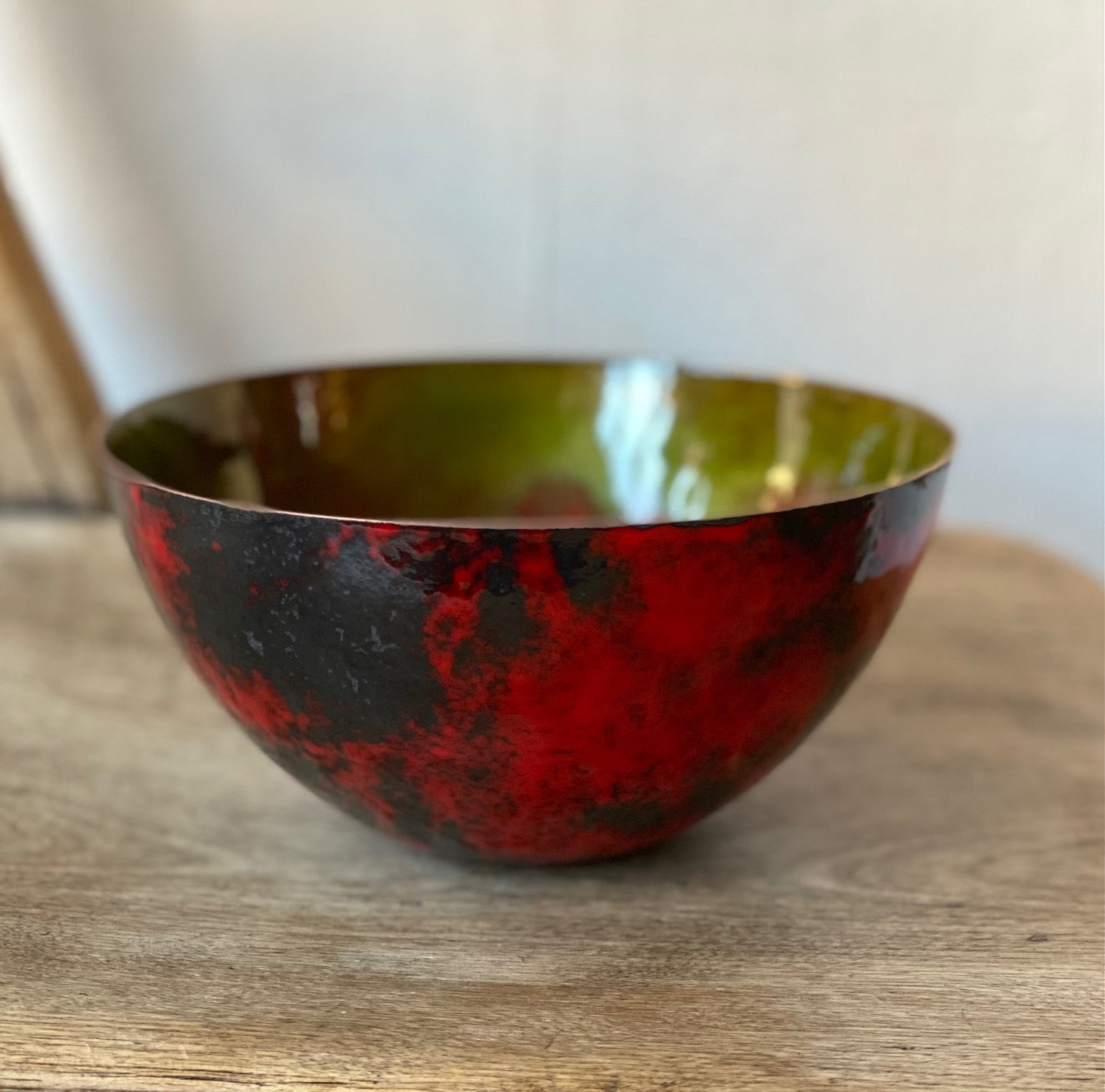 Large decorative vessel with red details, enamel on copper