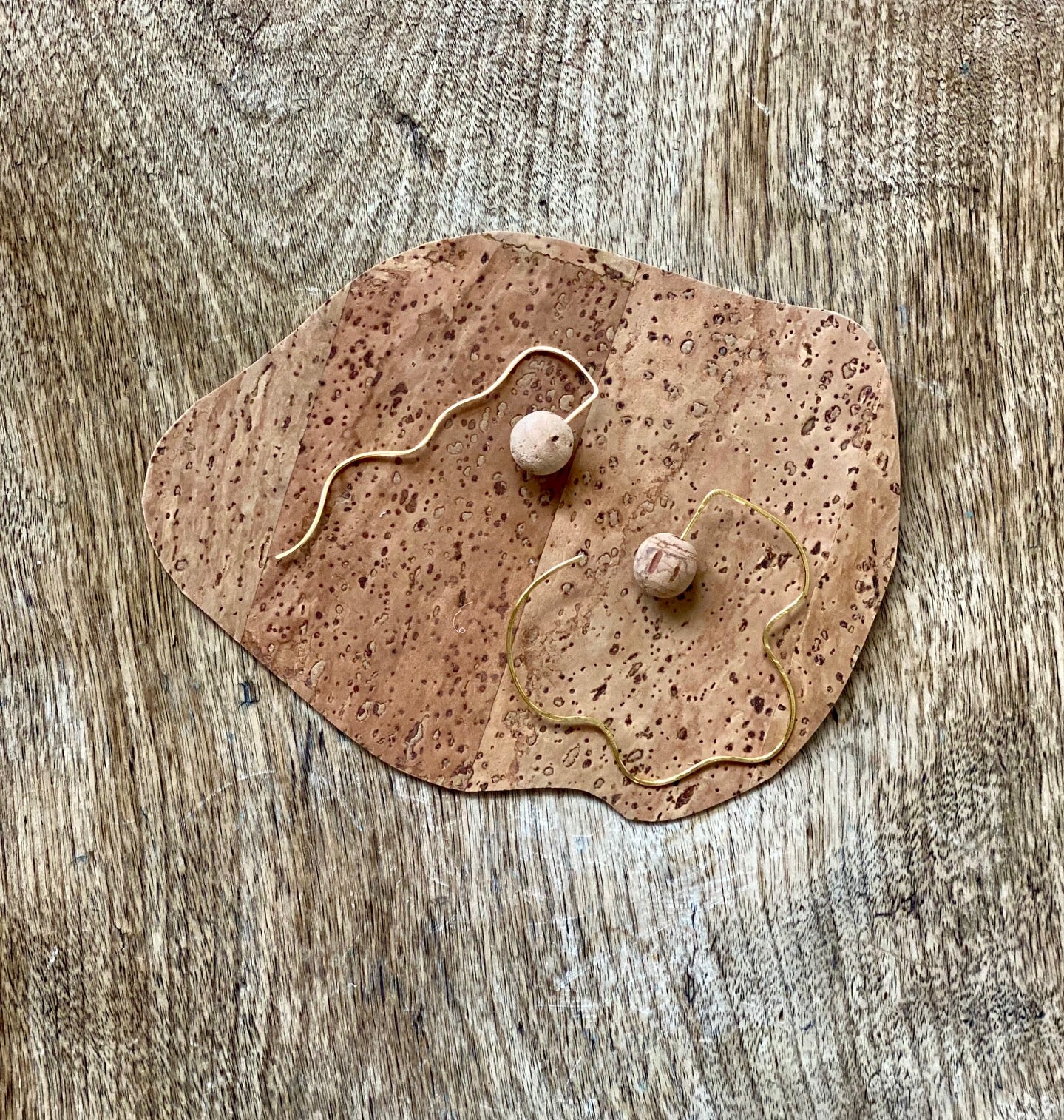 Perihelion Earrings in brass with cork backs