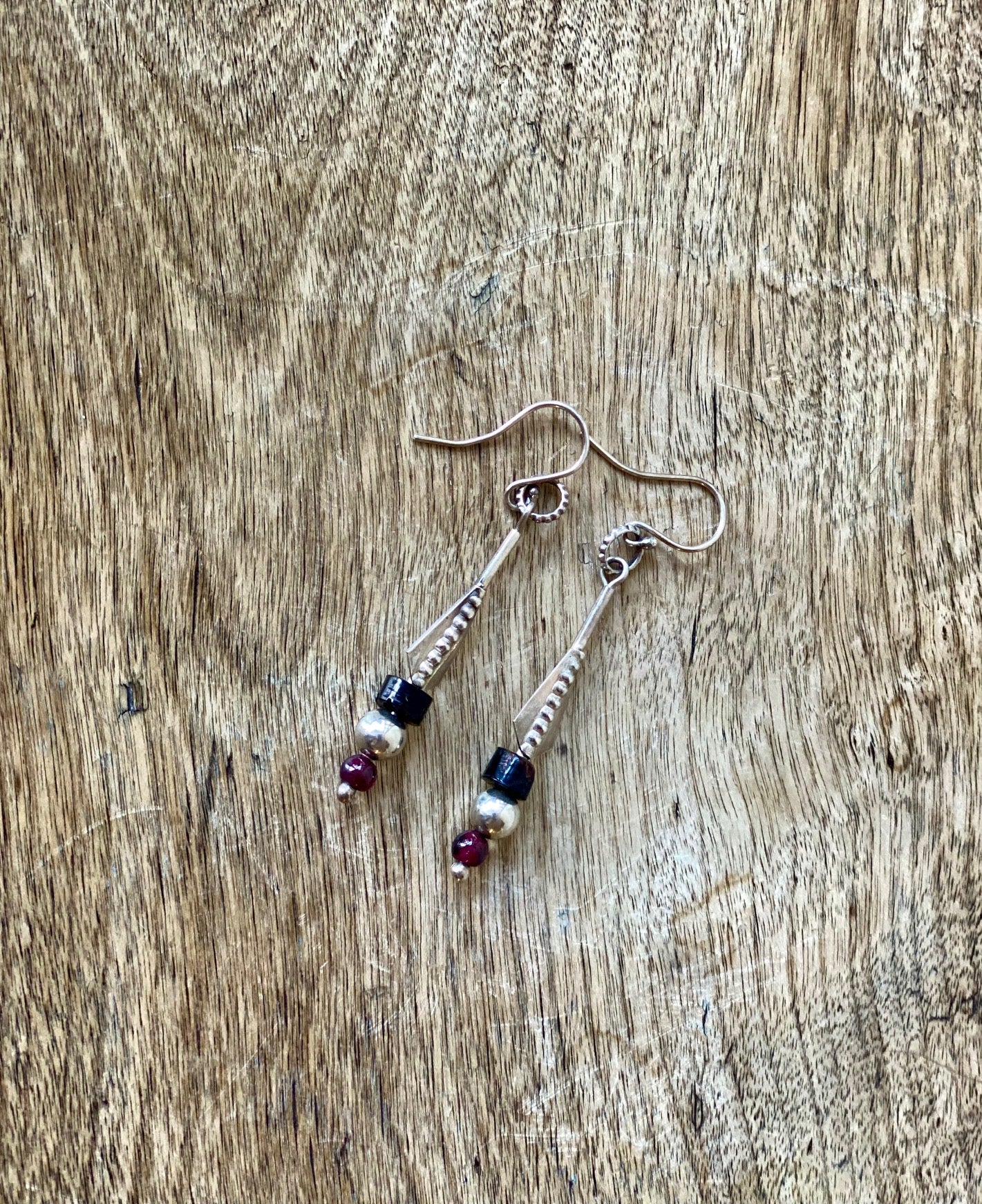 Silver, blackcoral and garnet drop earrings