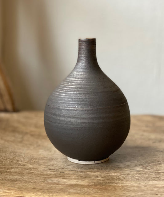 Dark metallic glaze curve vase