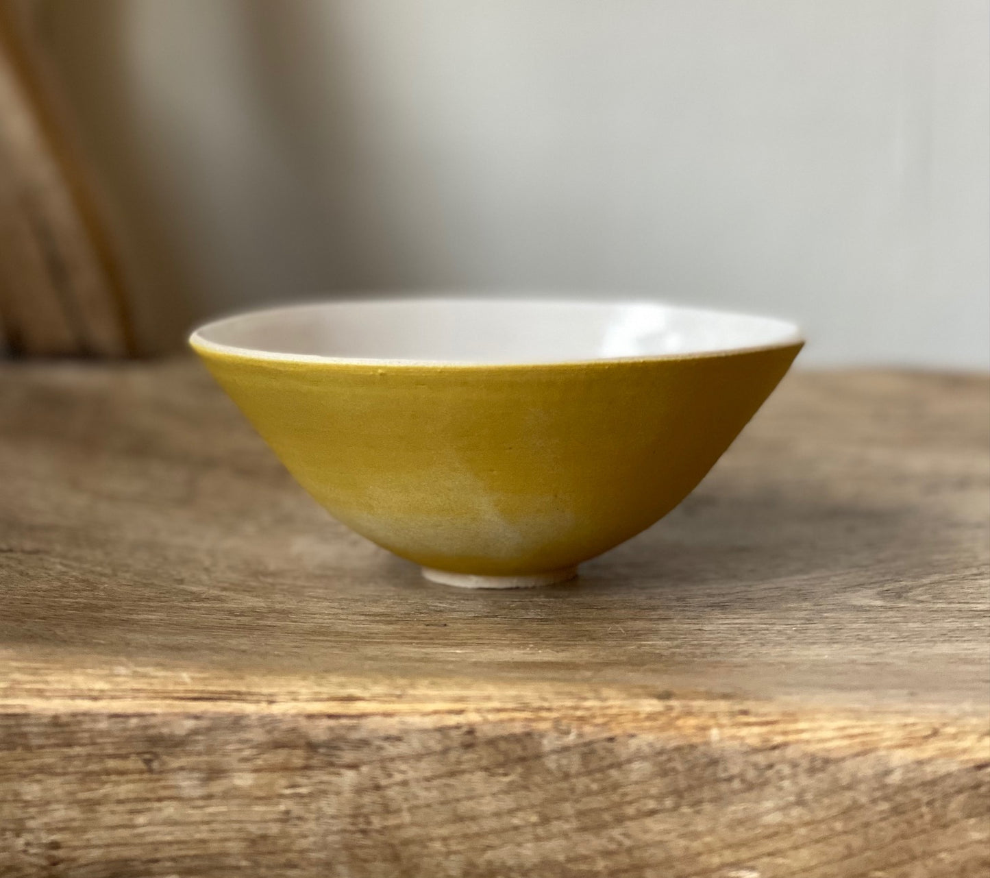 Small yellow splayed bowl